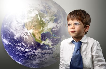 a child and  a globeの写真素材