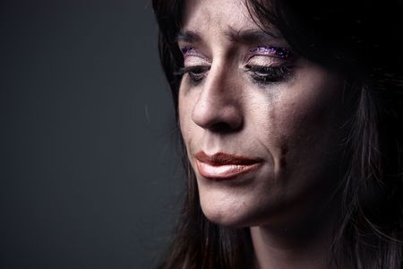 closeup of woman cryingの写真素材