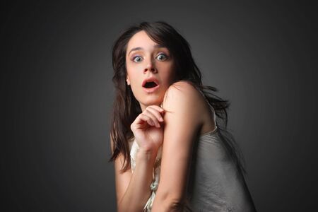 portrait of beautiful woman surprisedの写真素材