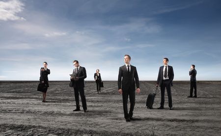 Group of business people standing on a fieldの写真素材