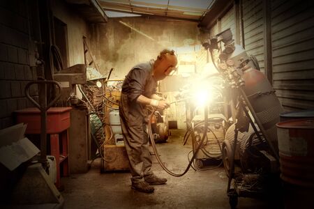 Worker using a blowtorchの写真素材
