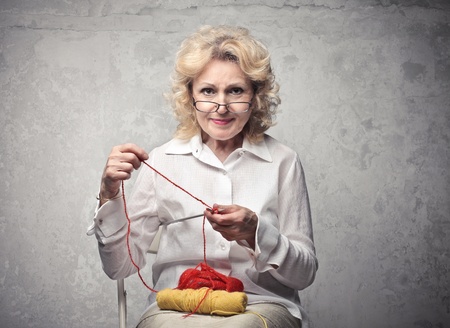 Senior woman knittingの写真素材