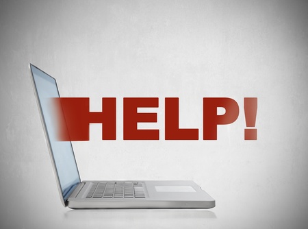 Word help coming out of a laptopの写真素材