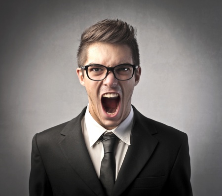 Angry businessman shoutingの写真素材