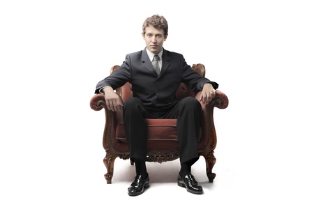 Businessman sitting on an armchairの写真素材