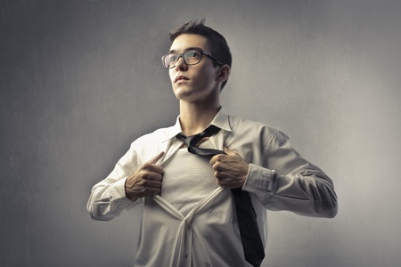 Businessman showing the tee shirt underneath his skirt