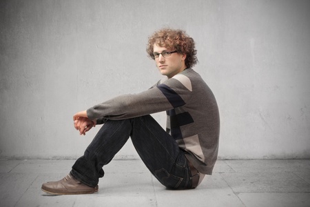 Seated handsome young manの写真素材