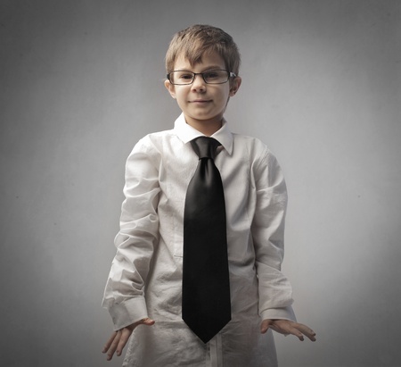 Child disguised as a businessmanの写真素材