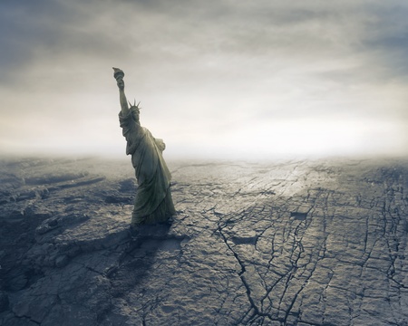 Statue of Liberty on dried earthの写真素材