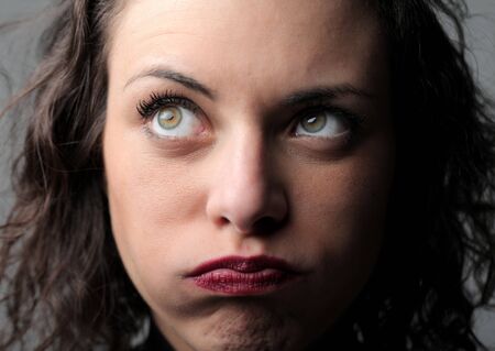 Bored young woman snorting