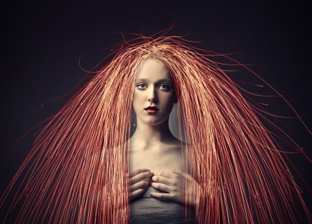 Beautiful woman with colored lines instead of her hairの写真素材