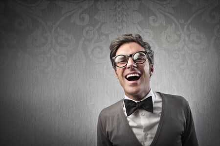 Fashionable man laughingの写真素材