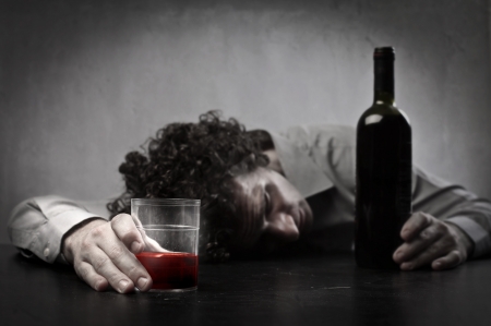 Man drunk with red wineの写真素材