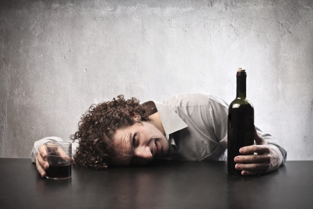 Man drunk with red wineの写真素材