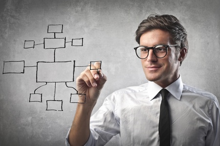 Businessman drawing a diagramの写真素材