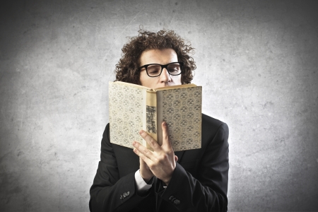 Professor reading a bookの写真素材