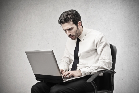 handsome businessman working with laptopの写真素材