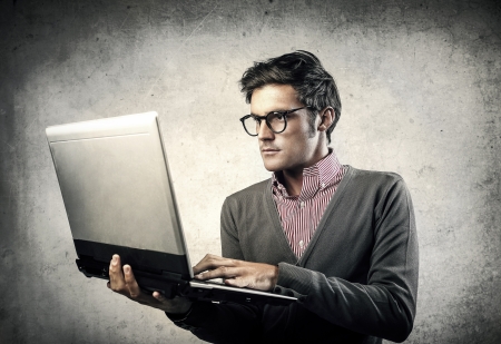 young businessman working with laptopの写真素材