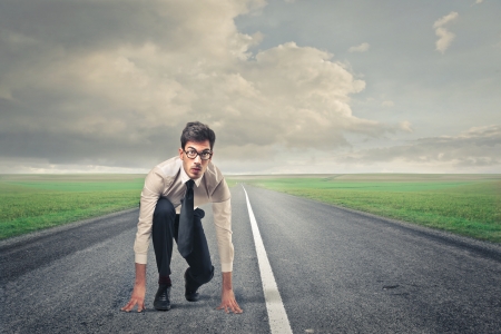 businessman about to runの写真素材