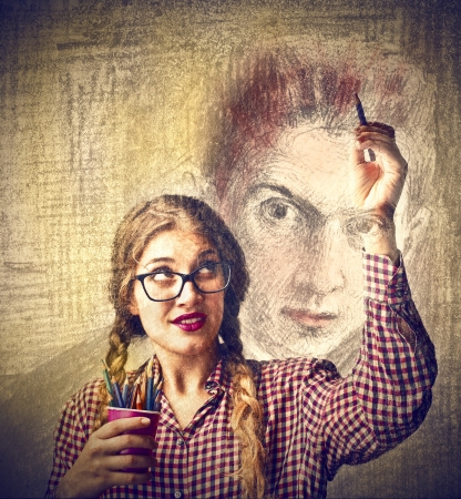 woman drawing a portraitの写真素材