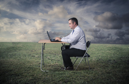 Working in a fieldの写真素材