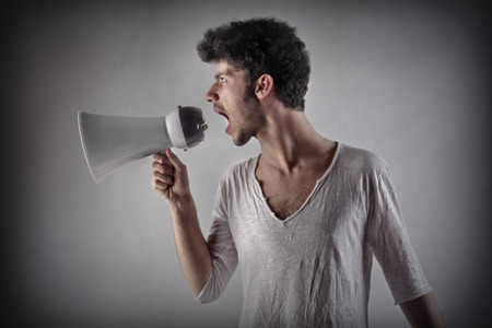 Announcing something to the worldの写真素材