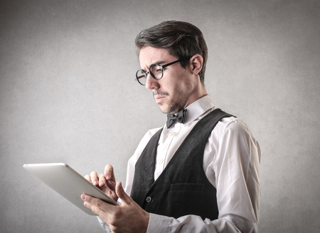 Using a tabletの写真素材