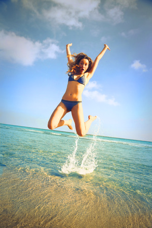 Happy woman at the seasideの写真素材