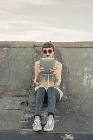 Using a tabletの写真素材