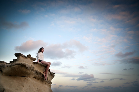 On top of a rockの写真素材