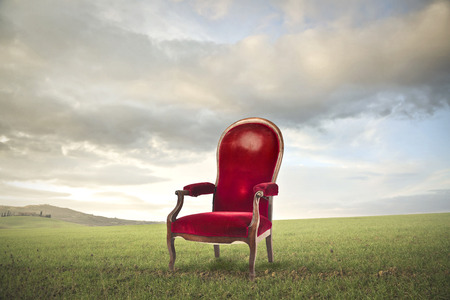 Red chair in a fieldの写真素材