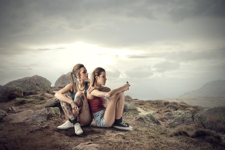 Two friends in the mountainsの写真素材