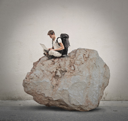 Explorer on a rockの写真素材