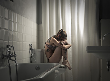 Girl in the bathroomの写真素材