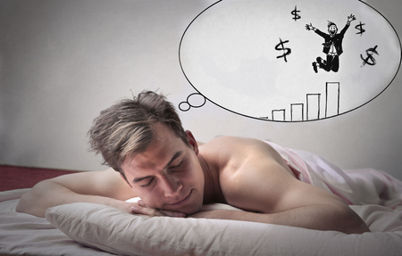 Man dreaming of becoming a successful businessmanの写真素材