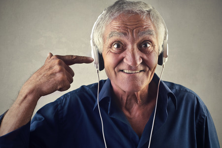 Man listening to music through headphones