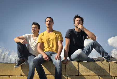 Three men thinking of somethingの写真素材