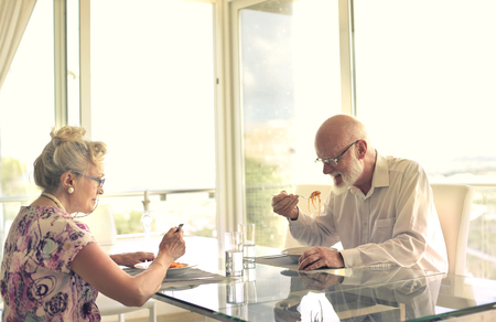 Couple eating at homeの写真素材