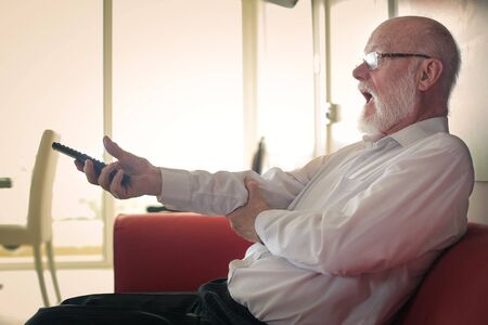 Man on the sofa watching tv