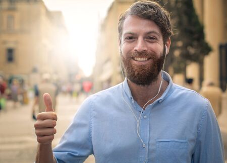 Happy bearded man feeling positive