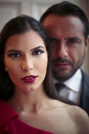 Elegant couple posing for a pictureの写真素材