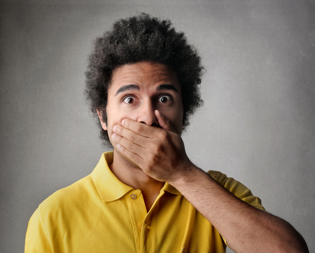 Shocked boy holding his breath