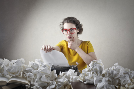 Woman writing a letterの写真素材