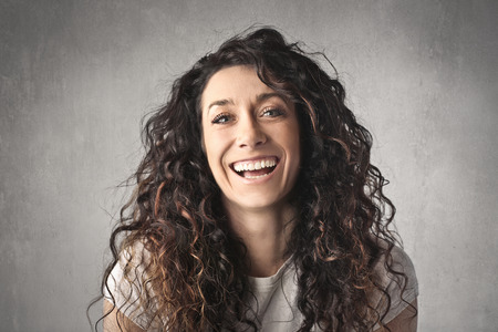 Woman with curly hairの写真素材