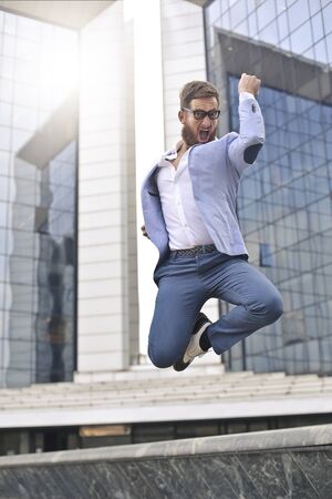 Jumping successful manの写真素材