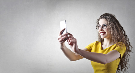 Young woman doing a selfie