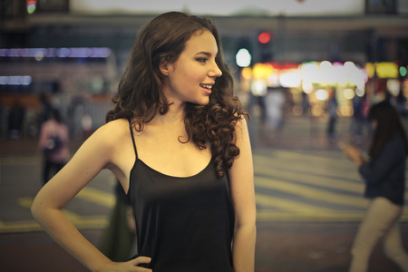 Girl hanging out at nightの写真素材