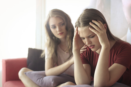 Helping a friendの写真素材