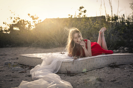 Sensual woman posing outdoorsの写真素材