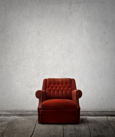 Red armchair in an empty roomの写真素材